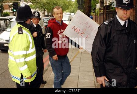 Mr Alisdare Hickson protesting at arrival of cleric Stock Photo