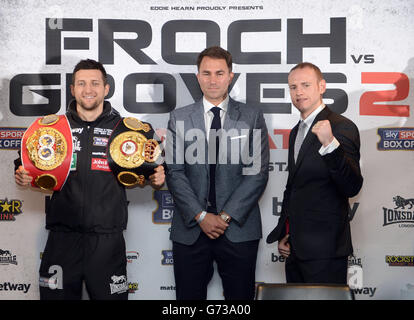 Carl Froch (left) and George Groves (right) with Boxing promoter Eddie Hearn during a Press Conference at Wembley Stadium, London. Stock Photo