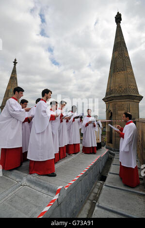 The Choir of St John's College, Cambridge, perform the Ascension Day carol from the top of the Chapel Tower at St John's College, a custom dating back to 1902. Stock Photo