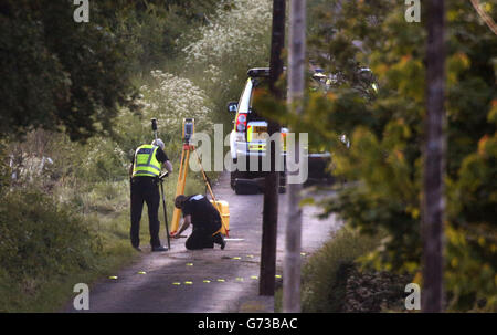 Police at the scene near Coldstream where two people were feared dead after a rally car lost control during the Jim Clark rally. Stock Photo