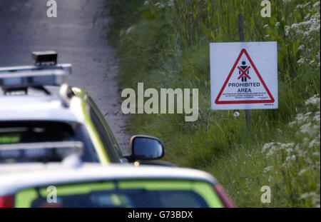 Police at the scene near Kelso in the Scottish Borders after a rally car lost control during the Jim Clark Rally and hit spectators, three were pronounced dead at the scene and a fourth is in a critical condition in Edinburgh Royal Infirmary. Stock Photo