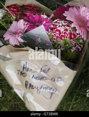 A floral tribute near the scene at Little Swinton, near Coldstream, where three people were killed after a car lost control at the Jim Clark Rally in the Scottish Borders yesterday. Stock Photo