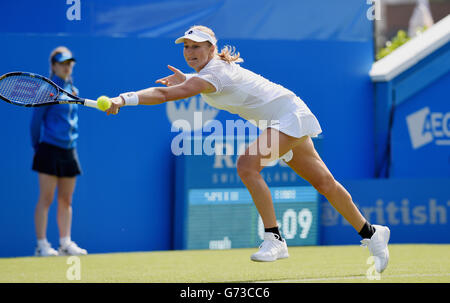 Ekaterina Makarova of Russia plays a forehand shot against Britain's Tara Moore in their first round match during The Aegon International Tournament at Devonshire Park, Eastbourne, Southern England. June 20, 2016. Simon  Dack / Telephoto Images Stock Photo