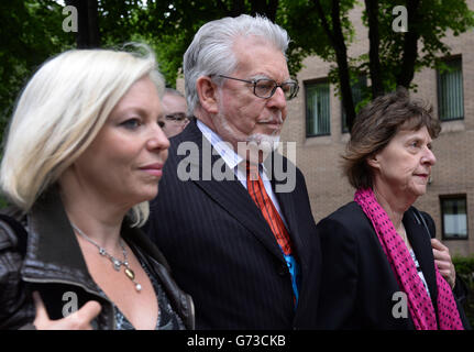 Veteran entertainer Rolf Harris arrives at Southwark Crown Court, London, with daughter Bindi (left) and niece Jenny (right), where he denies 12 counts of indecent assault between 1968 and 1986. Stock Photo