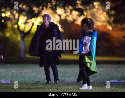 The new Doctor's companion Pearl Mackie spotted with Peter Capaldi (L) during filming at Cardiff University in Cardiff, South Wales. Stock Photo