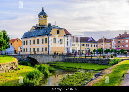 Soderkoping, Sweden - June 19, 2016: The town hall was built in 1776. Here seen with the river Storan flowing in front of it and Stock Photo
