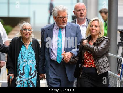 Veteran entertainer Rolf Harris arriving with daughter Bindi (right), wife Alwen at Southwark Crown Court, London, where he denies 12 counts of indecent assault between 1968 and 1986. Stock Photo