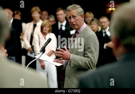 The Prince of Wales speaks at a reception for 84 primary school headteachers at his Highgrove Estate in Gloucestershire. The heads were chosen from a list of 300 improved successful primary schools published in the annual report of Her Majesty's Chief Inspector of Schools 2002-2003. Stock Photo