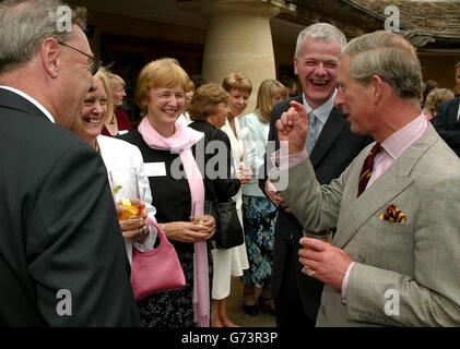 The Prince of Wales (right) and the Chief Inspector of School's David Bell at a reception for 84 primary school head-teachers at the Prince's Highgrove Estate in Gloucestershire. The heads were chosen from a list of 300 improved successful primary schools published in the annual report of Her Majesty's Chief Inspector of Schools 2002-2003. Stock Photo