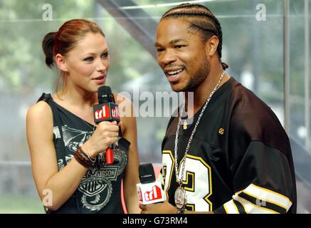 rap artist xzibit during his guest appearance on mtv's... MTV presenter Emma Griffiths with rap artist Xzibit during his guest ...