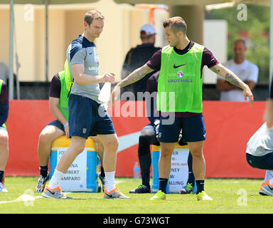 Soccer - World Cup 2014 - Miami Training Camp - England v Honduras - England Training Session - Barry University. England's Jack Wilshere is sprayed with water to help rehydrate during a training session at Barry University, Miami, USA. Stock Photo