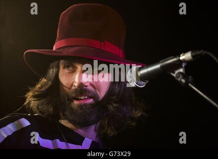 Sergio 'Serge' Pizzorno of Kasabian performing at HMV in London to celebrate the release of their fifth album '48:13'. Stock Photo