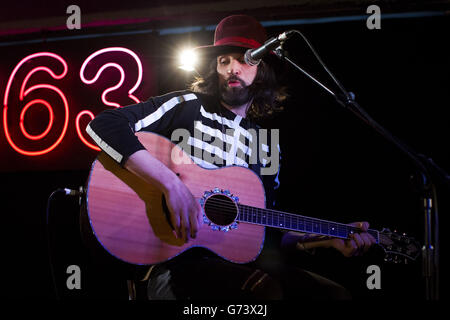 Sergio 'Serge' Pizzorno of Kasabian performing at HMV in London to celebrate the release of their fifth album '48:13'. Stock Photo