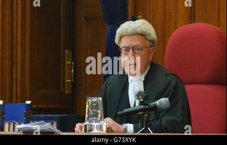 EDITORIAL USE ONLY A still taken from a video feed of the filming of Lord Justice Gross in the Court of Appeal, London, as the 'core' of a major terrorism trial can be held in secret, the Court of Appeal has ruled. Stock Photo