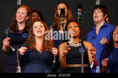 The Lewisham and Greenwich NHS Choir performing on The Pyramid Stage at the Glastonbury Festival, at Worthy Farm in Somerset. Stock Photo