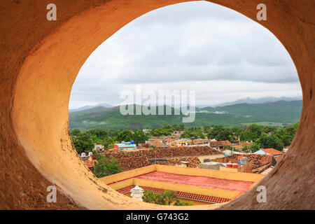 View over colonial Trinidad rooftops and the mountains beyond, from the bell tower in the historic town of Trinidad, Cuba Stock Photo