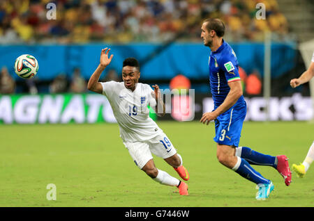 England's Raheem Sterling (left) in action with Italy's Giorgio Chiellini Stock Photo