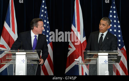 British Prime Minister David Cameron (left) holds a press conference with US President Barack Obama during the G7 Summit held at the EU headquarters in Brussels, Belgium. Stock Photo