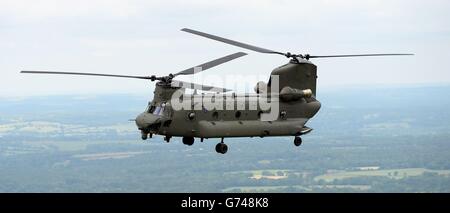 The new Chinook Mk6 helicopter in flight over Hampshire during an unveiling at RAF Odiham in Hampshire. Stock Photo