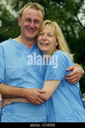 Karen Shand, 40, from Kirkcaldy, Fife, celebrates with her paramedic partner William Logan outside Victoria Hospital, Kirkcaldy, Scotland, after winning 1 million on the live television quiz show 'The Vault'. Ms Shand clinched the life-changing prize - the largest amount of money ever won on live TV - after she answered six questions correctly. Stock Photo