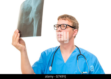 Doctor holding an x-ray pelvis isolated on white background Stock Photo