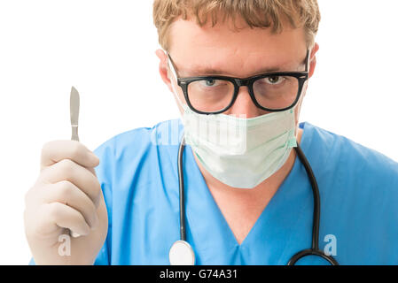 male surgeon holding a scalpel on a white background Stock Photo