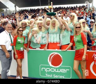 Former England cricketer Mike Gatting (left) with the 'unofficial' npower girls, winners of the Fancy Dress Award at the at the second npower Test match between England and West Indies at Edgbaston, Birmingham. Stock Photo