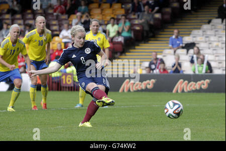 Soccer - FIFA Women's World Cup Canada 2015 Qualifier - Group 4 - Scotland v Sweden - Fir Park. Scotland's Kim Little scores a goal from the spot during the FIFA Women's World Cup qualifying match at Fir Park, Motherwell. Stock Photo