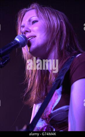 Singer Thea Gilmore performing on stage at the 40th Cambridge Folk Festival. Stock Photo