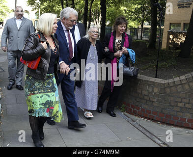 Veteran entertainer Rolf Harris arrives at Southwark Crown Court, London, with daughter Bindi (left), wife Alwen and niece Jenny (right), where he denies 12 counts of indecent assault between 1968 and 1986. Stock Photo