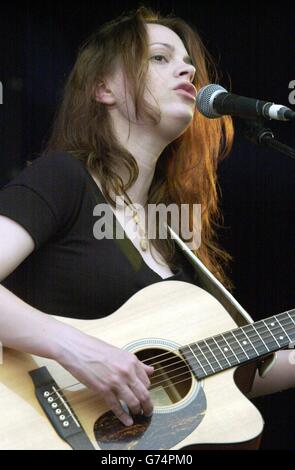 American singer Mindy Smith performing on stage at the 40th Cambridge Folk Festival. Stock Photo