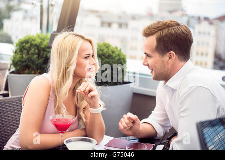 Nice couple sitting in the cafe Stock Photo