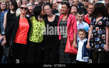 The family of Gerry Conlon, who was wrongly convicted of the 1974 IRA Guildford pub bombing, arrive at St Peter's Cathedral, Belfast, for his funeral. Stock Photo
