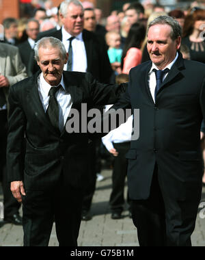 Birmingham Six member Paddy Hill (left) and Guilford Four member Paddy Armstrong attend the funeral of Gerry Conlon, who was wrongly convicted of the 1974 IRA Guildford pub bombing, at St Peter's Cathedral, Belfast. Stock Photo