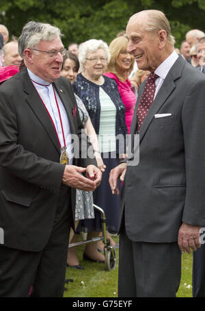 The Duke of Edinburgh meets guests during a garden party at Buckingham ...