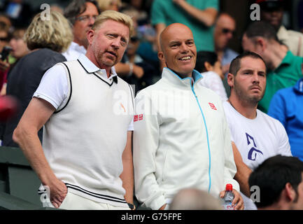 Boris Becker, coach of Serbia's Novak Djokovic in the players box during day five of the Wimbledon Championships at the All England Lawn Tennis and Croquet Club, Wimbledon. Stock Photo