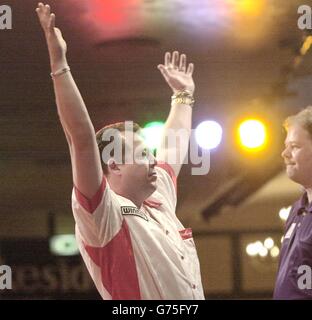 Mervyn King celebrates his win over Raymond Barneveld of Holland in their quarter final match in the Embassy World Darts Championships at the Lakeside Country Club, Frimley Green,Surrey. Stock Photo