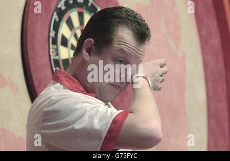 Mervyn King shows emotion after beating Raymond Barneveld of Holland in their quarter final match in the Embassy World Darts Championships at the Lakeside Country Club, Frimley Green,Surrey. Stock Photo