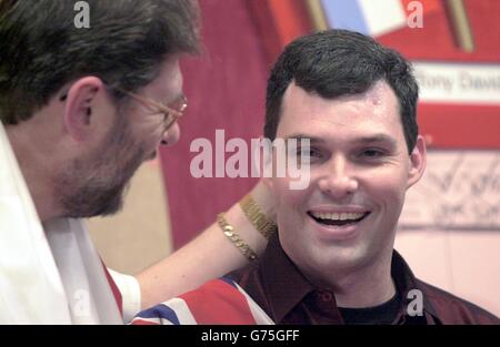 Winner Tony David (right) from Australia is congratulated by opponent Martin Adams, after their Semi Final of Embassy World Darts match at the Lakeside Country Club, Frimley Green Surrey. Stock Photo