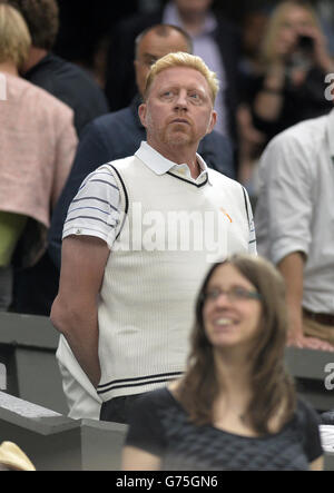 Tennis - 2014 Wimbledon Championships - Day Eight - The All England Lawn Tennis and Croquet Club. Boris Becker, coach of Serbia's Novak Djokovic, watches his match against France's Jo-Wilfried Tsonga Stock Photo