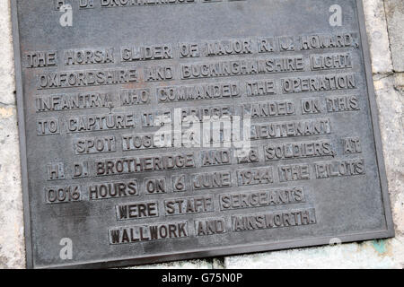 Plaque on marker for the first glider to land beside Caen Canal Bridge (Pegasus Bridge), Normandy on D-Day, 6th June 1944. Stock Photo