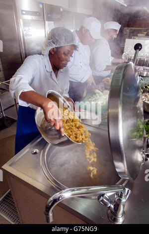 Preparations for lunch in a commercial kitchen. Stock Photo