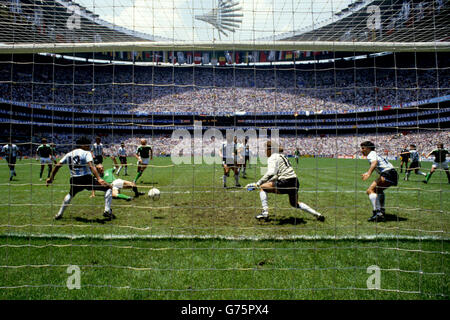 Soccer - 1986 FIFA World Cup - Final - Argentina v West Germany - Azteca Stadium, Mexico. Karl-Heinz Rummenigge scores West Germany's first goal against Argentina. Stock Photo