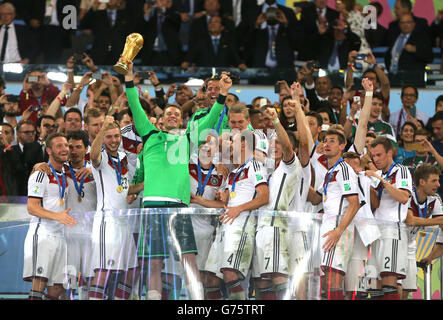 Soccer - FIFA World Cup 2014 - Final - Germany v Argentina - Estadio do Maracana. Germany goalkeeper Manuel Neuer lifts the FIFA World Cup 2014 Trophy Stock Photo