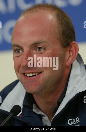 Ian Walker, skipper of Britain's America's Cup team GBR Challenge smiles after finally winning a race, against the French yacht Le Defi Areva in the Hauraki Gulf off Auckland, New Zealand. Eventually winning by just 13 seconds, it was GBR's first point in three races. Stock Photo