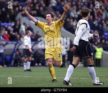 Leeds United's Robbie Fowler celebrates his third goal to complete his
