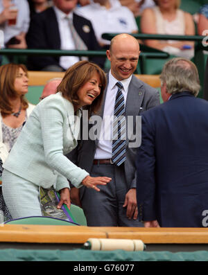 Carole Middleton and Matt Dawson with Sir Terry Wogan (right) in the royal box on centre court during day five of the Wimbledon Championships at the All England Lawn Tennis and Croquet Club, Wimbledon. Stock Photo