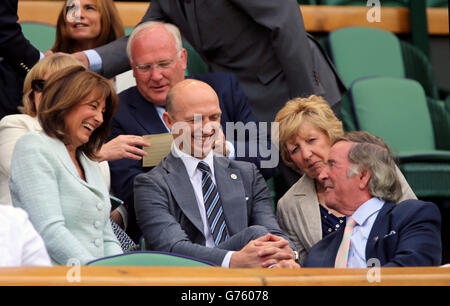 Carole Middleton and Matt Dawson with Sir Terry Wogan (right) in the royal box on centre court during day five of the Wimbledon Championships at the All England Lawn Tennis and Croquet Club, Wimbledon. Stock Photo