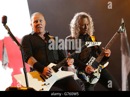 James Hetfield and Kirk Hammett of Metallica performing on the Pyramid Stage at the Glastonbury Festival, at Worthy Farm in Somerset. Stock Photo