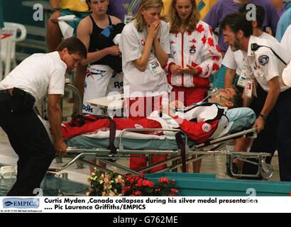 Curtis Myden ,Canada collapses during his silver medal presentation Stock Photo